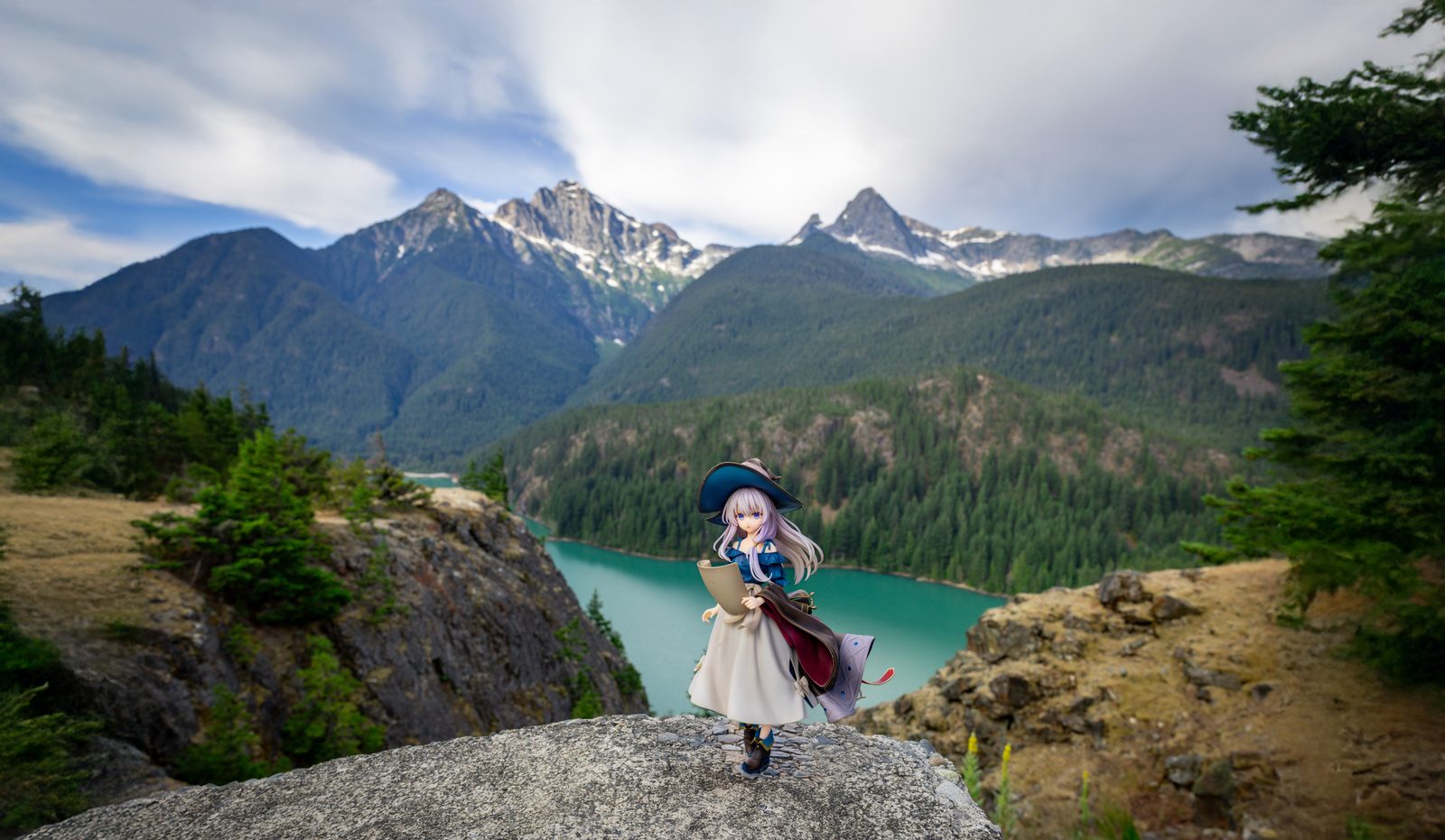 Figure over turquoise lake