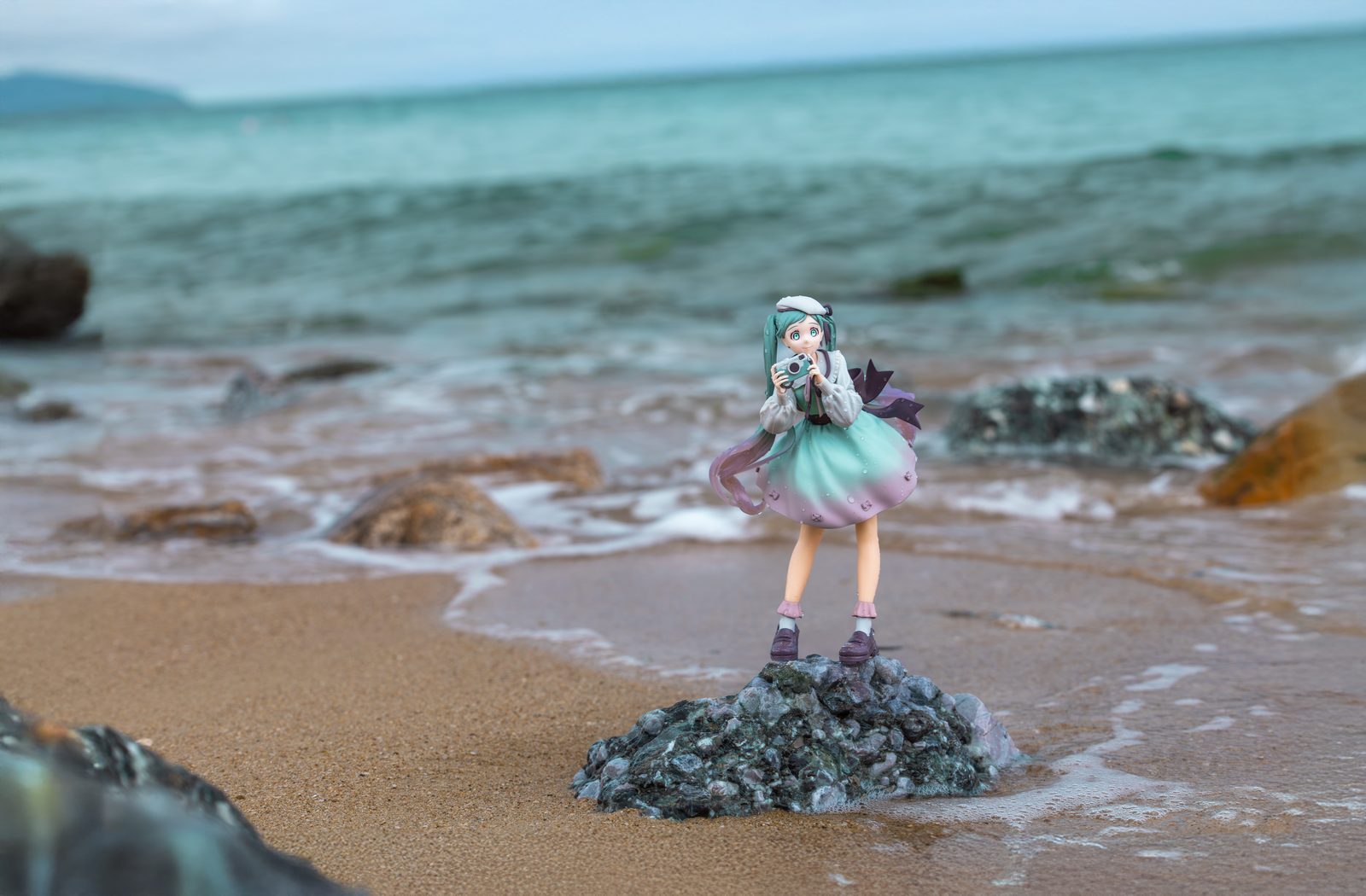Figure on beach rocks