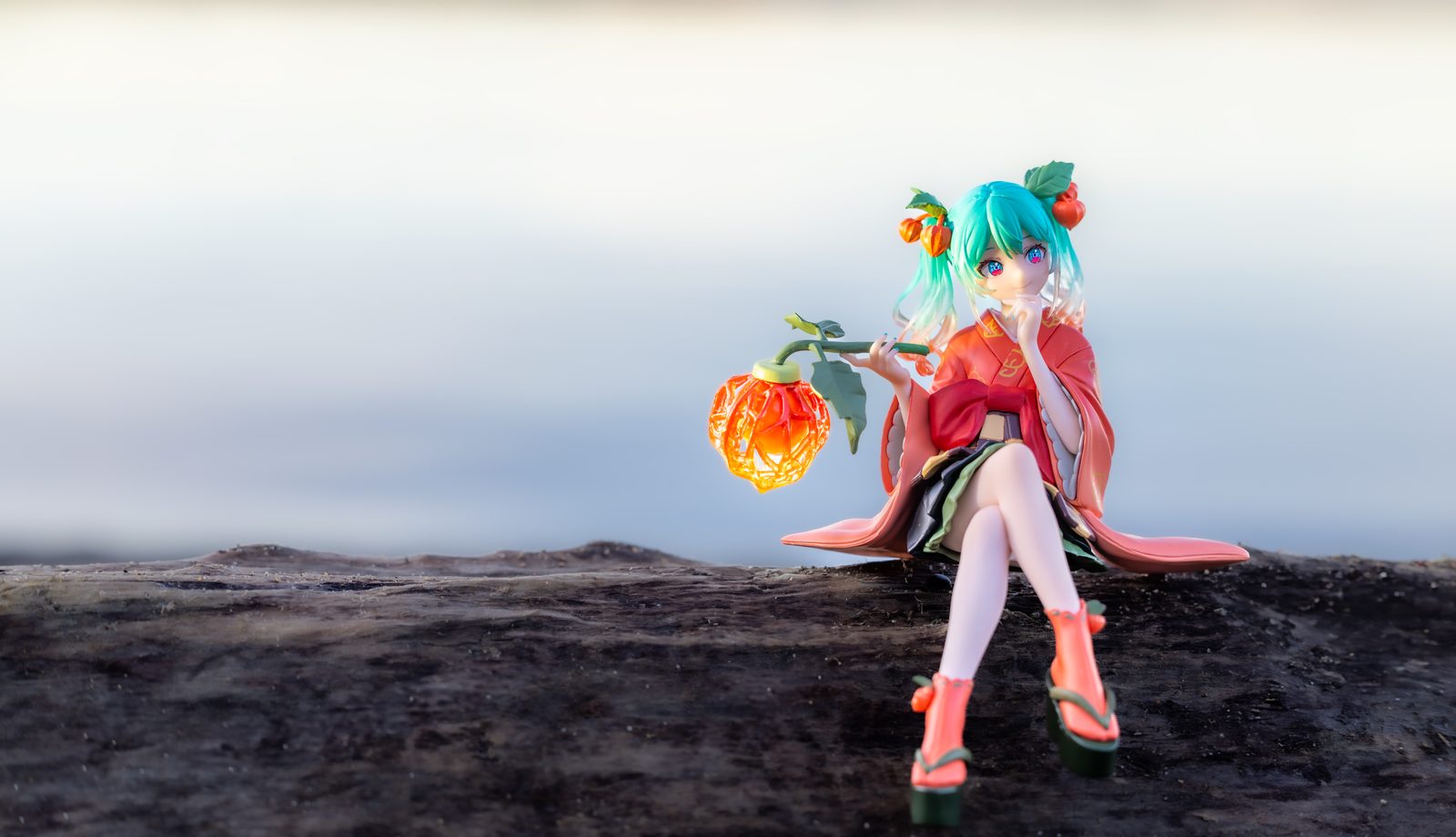 Figure with glowing lantern