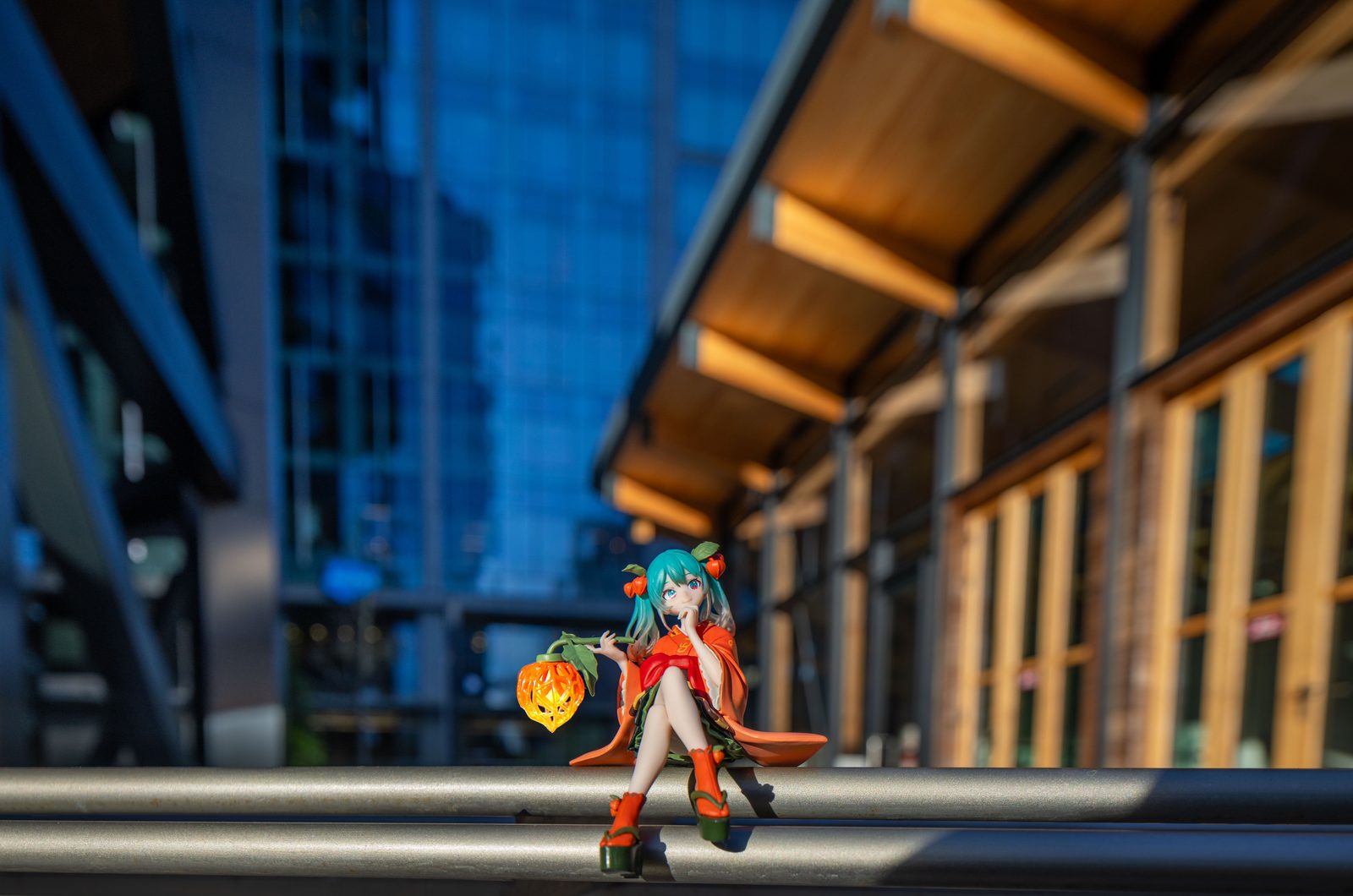 Figure at modern glass building